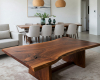 A rectangular live edge suar table with a mesmerizing, topographic grain pattern and a prominent, dark focal-point knot.