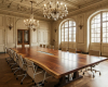 A monumental, bookmatched live edge boardroom tabletop with a symmetrical grain and a central, recessed tech channel.