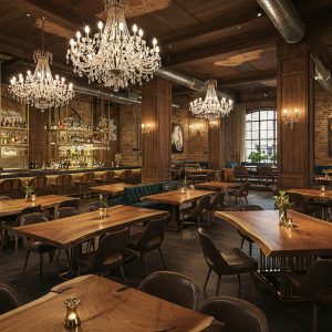 The intimate, industrial-luxe atmosphere of this restaurant is created by bespoke live edge suar wood tables.