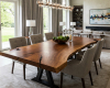 An 8-seater live edge dining tabletop featuring deep, kintsugi-style filled fissures that trace across the warm suar wood like dark rivers.