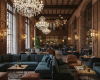 The opulent atmosphere of a grand, traditional restaurant, featuring custom solid wood tables and a classic bar.