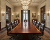 An ultra-luxury, 10-seater boardroom tabletop with a bookmatch join that creates a perfect, mirror-image wood grain.
