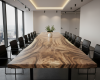 A monstrous, 18-seater live edge boardroom tabletop, featuring a wild, untamed tiger-stripe grain on a giant slab.