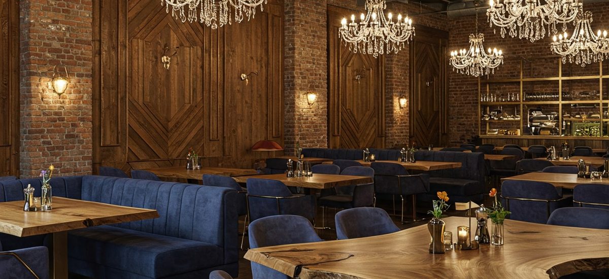 An ultra-luxury boutique restaurant's atmosphere is set by its freeform live edge tables and wood paneling.